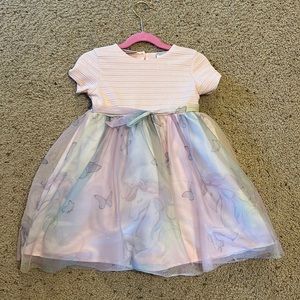Beautiful girls twirl dress for wedding or event with unicorn tulle